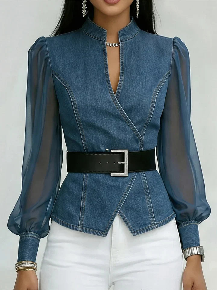 Blusa elegante entallada con un cinturón refinado