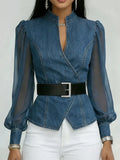 Blusa elegante entallada con un cinturón refinado