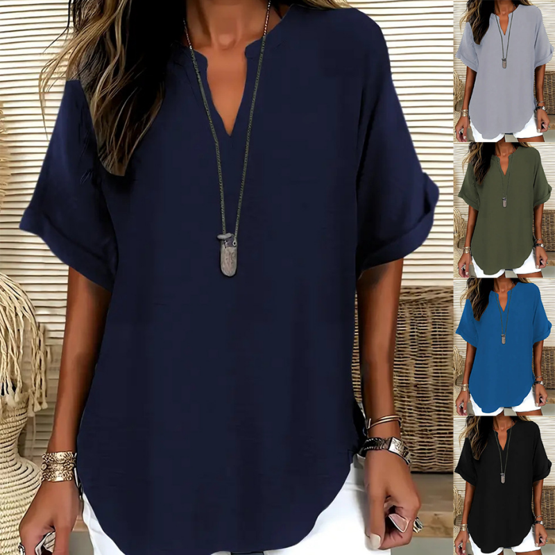 Blusa elegante y holgada con cuello abierto
