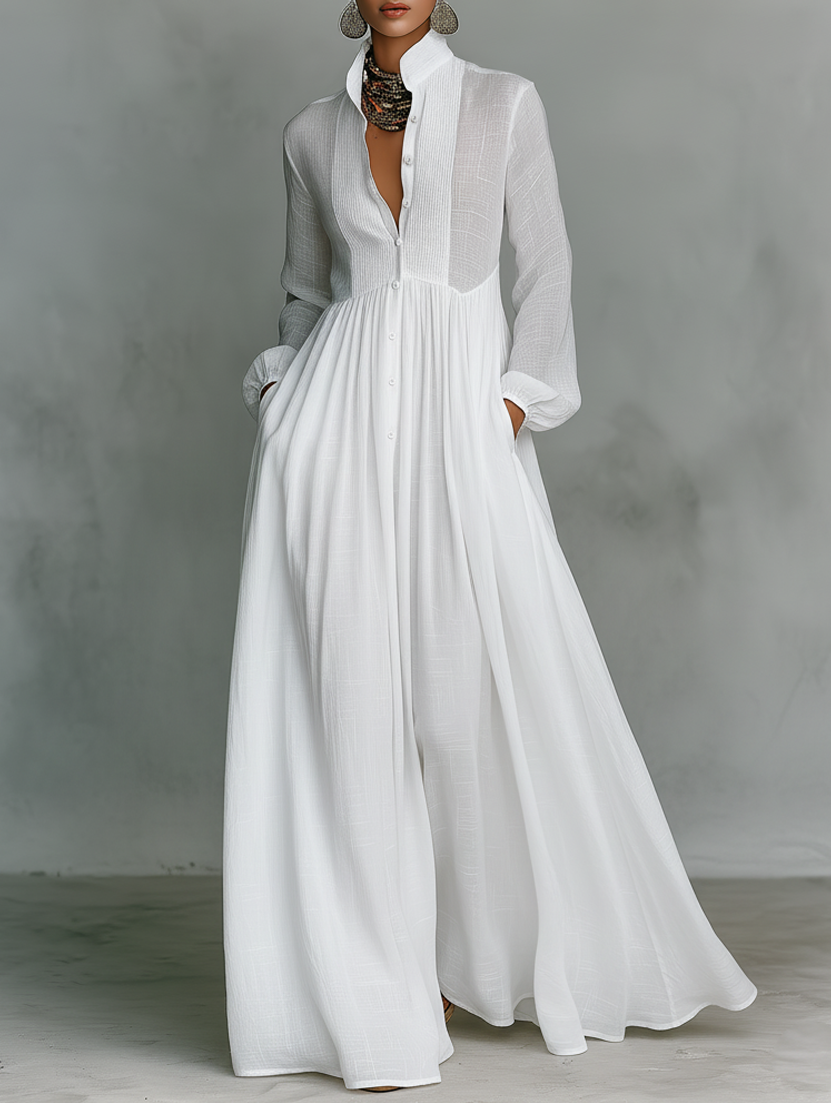Maxi minimalista de algodón y lino con patchwork, cuello alto y mangas largas