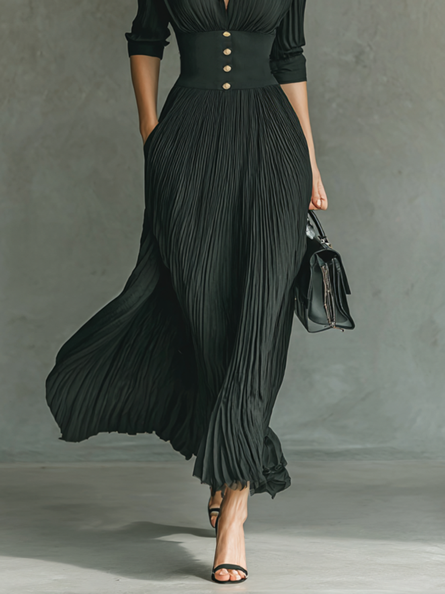 Elegante vestido plisado con cintura estructurada