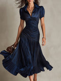| Vestido midi satinado con rayas retro