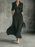 Elegante vestido plisado con cintura estructurada
