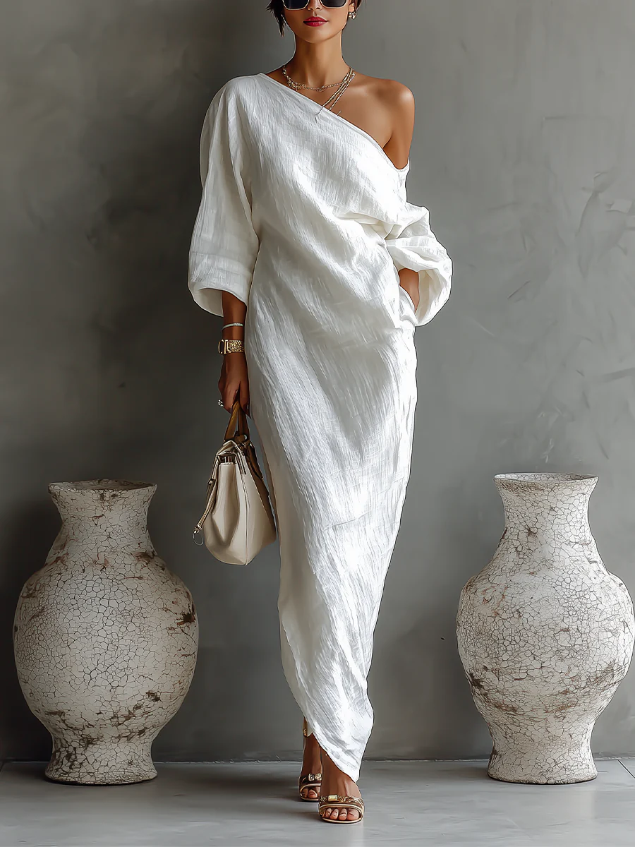 | Vestido largo, elegante y fluido con un hombro blanco