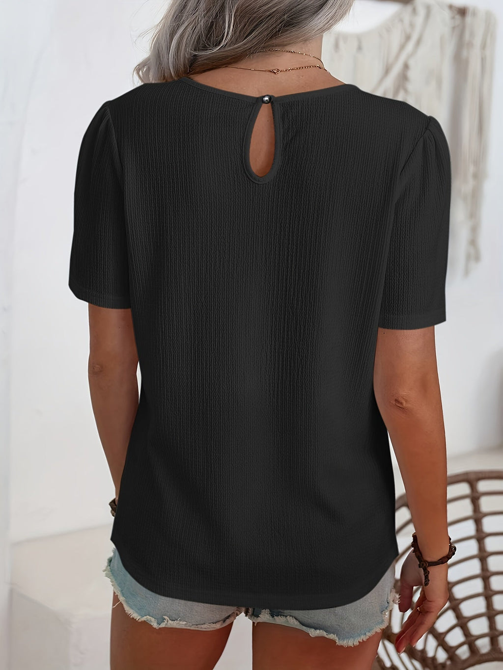 Camiseta elegante con un sutil relieve