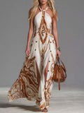 Beatrice | Vestido largo vintage de estilo bohemio con cuello halter, estampado western marrón sobre gasa marfil, con aberturas