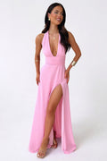 | Elegante vestido largo con cuello halter y abertura alta