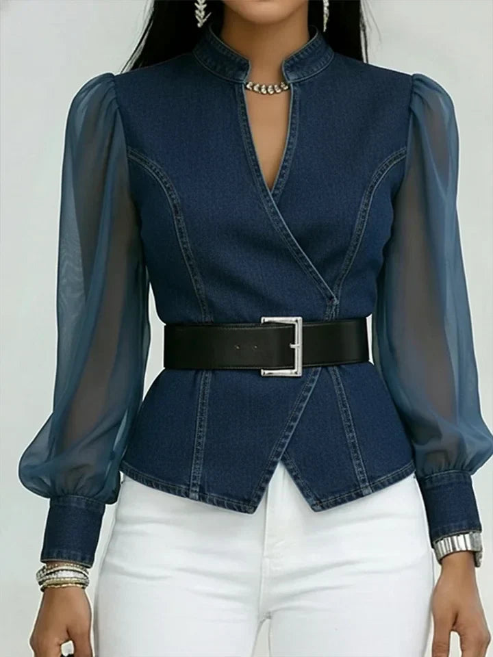 Blusa elegante entallada con un cinturón refinado