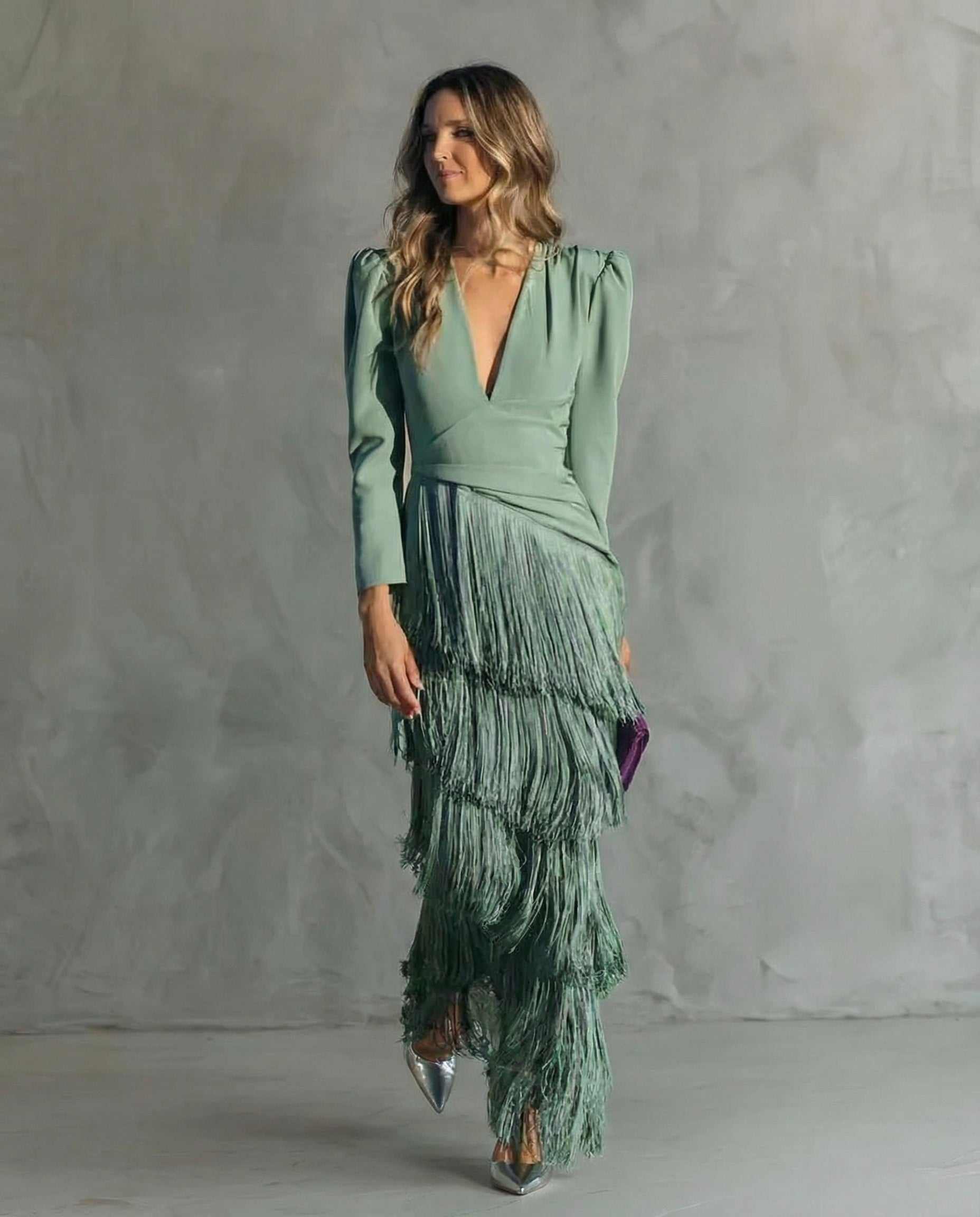 Abito elegante con maniche a frange