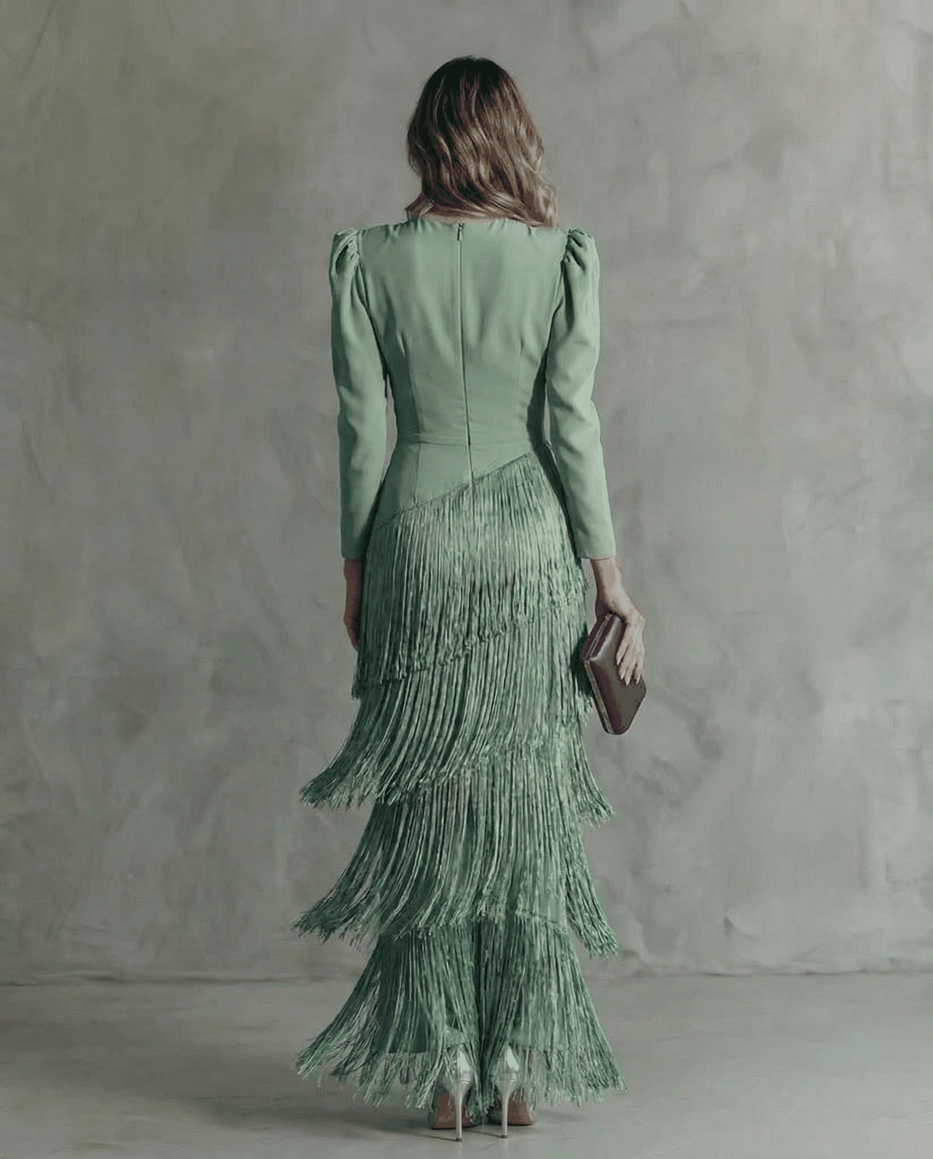 Abito elegante con maniche a frange